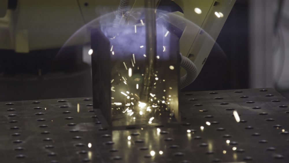 Robotic arm conducting precision manufacturing with advanced engineering in Texas