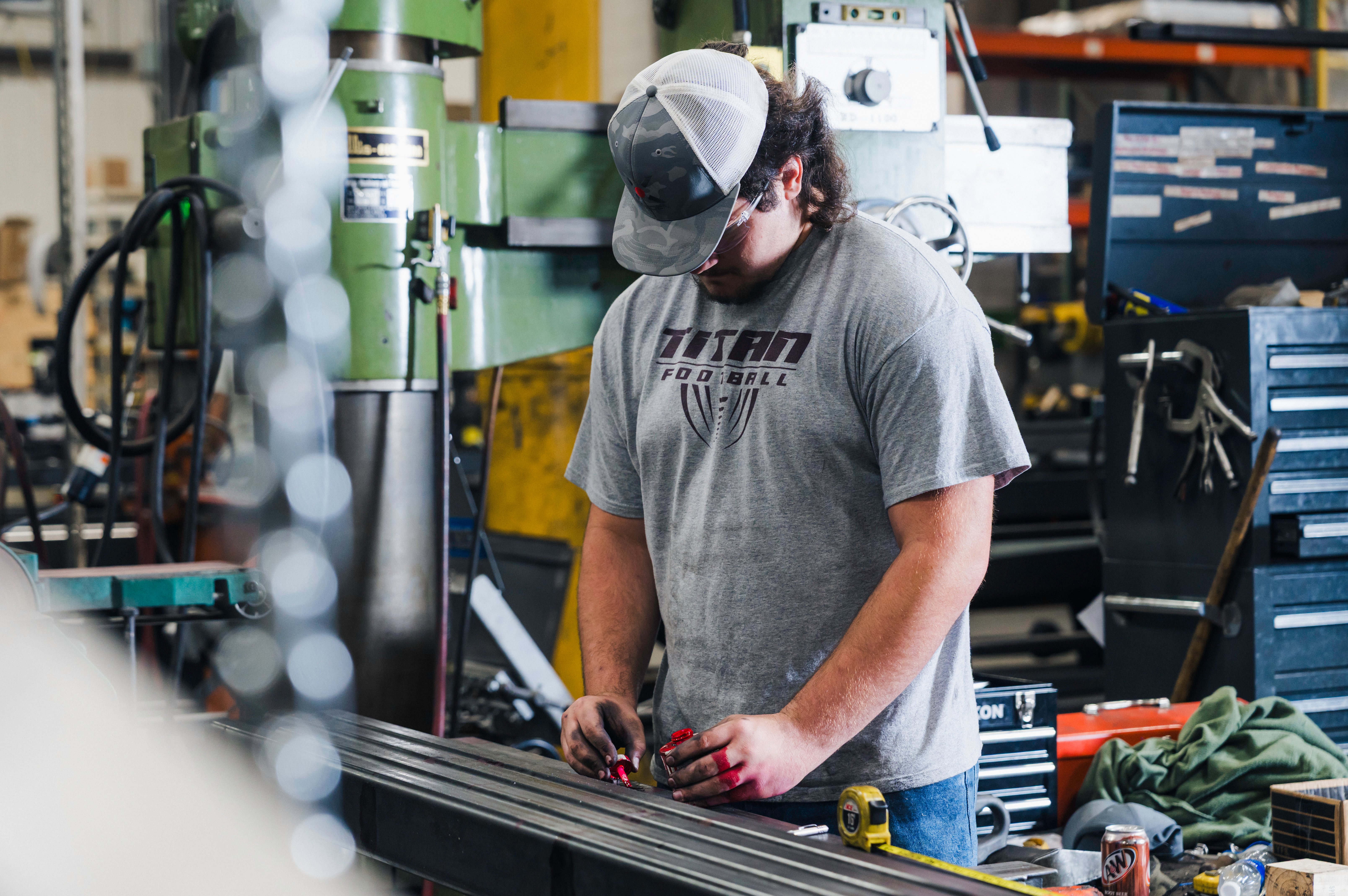 StrongStart students receiving hands-on workforce training inside NexGen Manufacturing’s Knightstown facility.