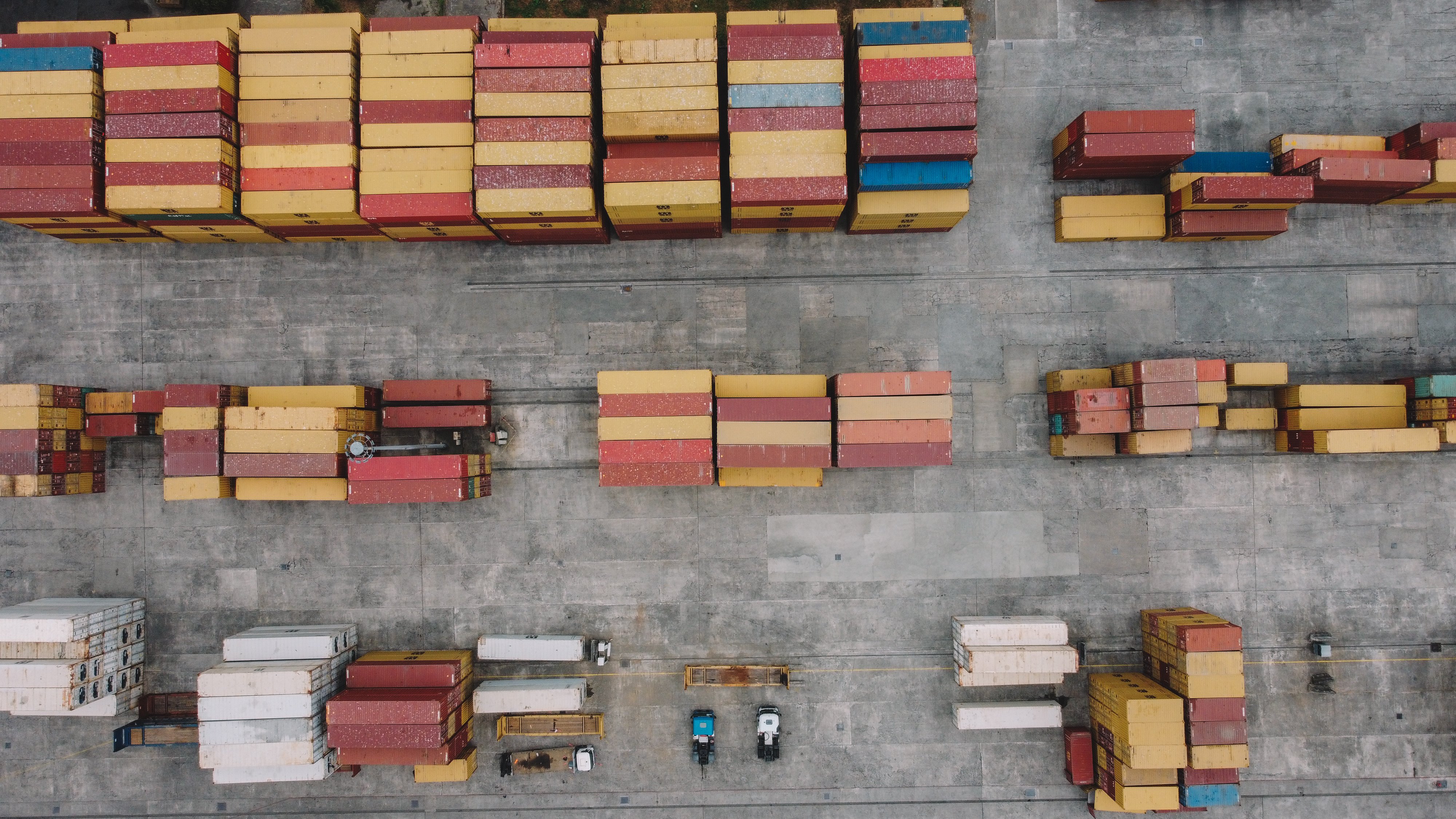 Shipping_Containers_In_Warehouse_Aerial_original_2682295